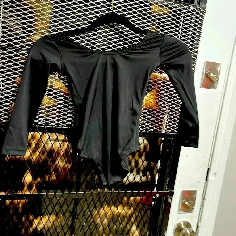 Girls dance/gymnastics top. Black . New with tags. By Mdnmd.